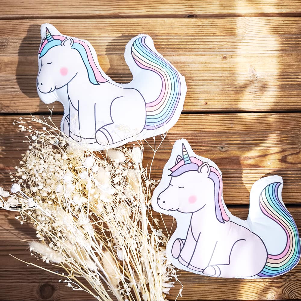 doudou attache tétine en tissus licorne de couleur blanche ou rose, vue de face, fabriqué avec amour en France